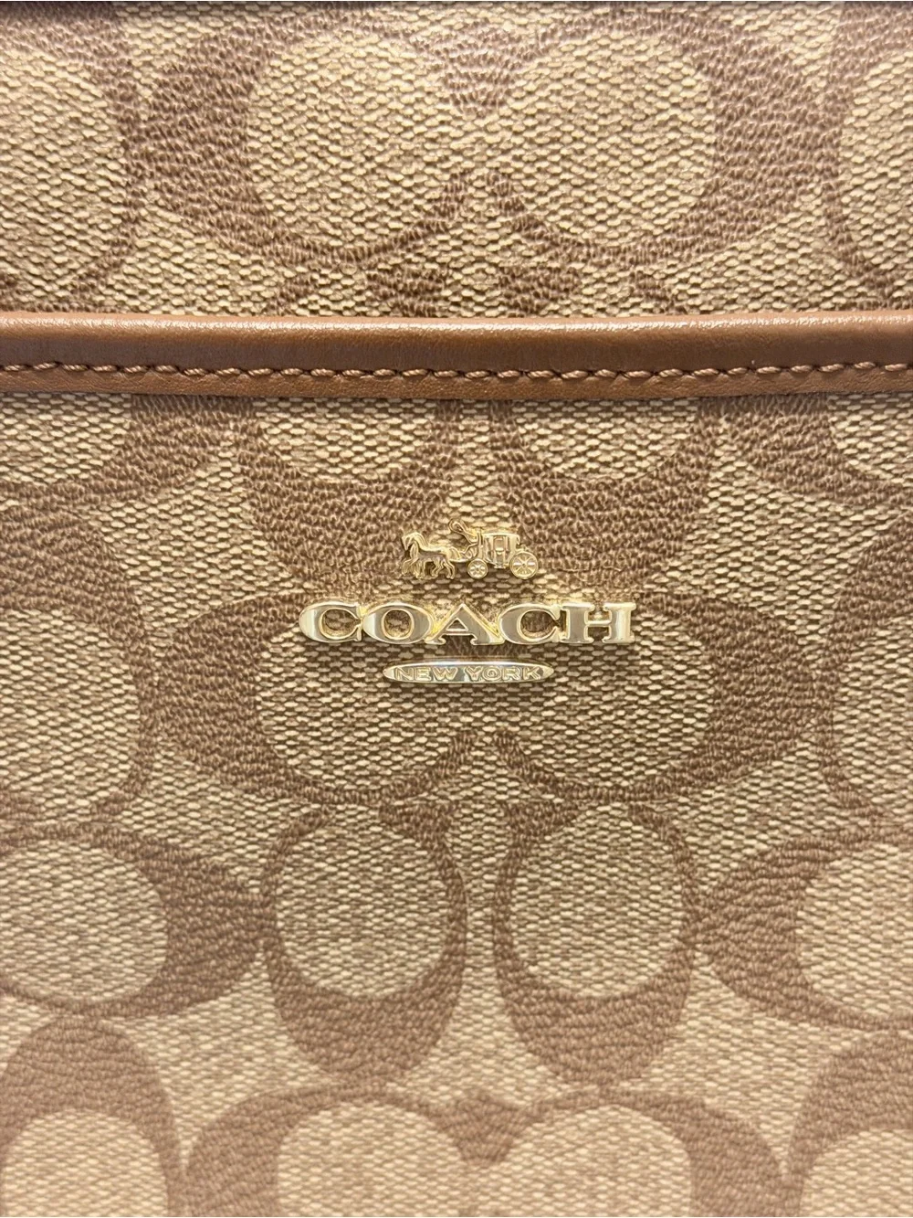 Coach Signature File Crossbody Bag. One of Coach's most popular daily silhouette